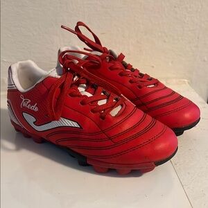 Red Soccer Cleats with Black Accents